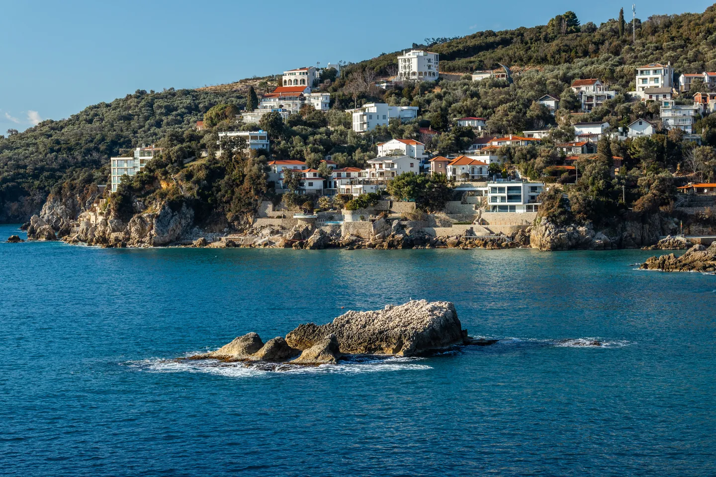 Houses above a bay on the Montenegrin coast